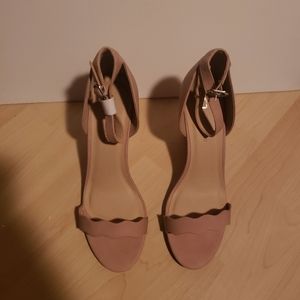 Tan wedge wrap around ankle sandals.